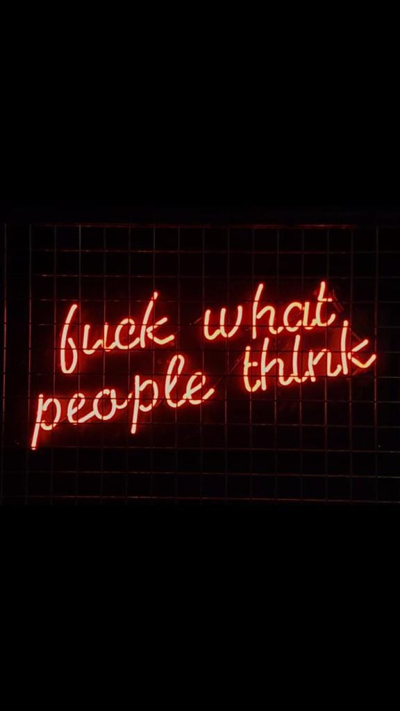Neon Sign with letters saying Fuck what people think